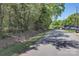 A quiet street in a residential neighborhood with mature trees lining the road at 4271 Candlewood Dr, Sherrills Ford, NC 28673