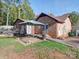 Brick home with gazebo, deck, and fenced backyard at 4706 Calico Ct, Charlotte, NC 28212