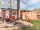 Brick home with a large backyard and patio at 7101 Ridgebrook Dr, Charlotte, NC 28210