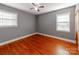 Bedroom with hardwood floors and gray walls at 7101 Ridgebrook Dr, Charlotte, NC 28210