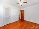 Bedroom with hardwood floors and neutral walls at 7101 Ridgebrook Dr, Charlotte, NC 28210