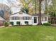 Charming ranch home with landscaped lawn and carport at 7101 Ridgebrook Dr, Charlotte, NC 28210