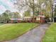 Ranch home with carport and large yard at 7101 Ridgebrook Dr, Charlotte, NC 28210