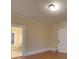 Simple bedroom with hardwood floors and an ensuite bathroom at 126 E Division Ave, Salisbury, NC 28144