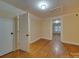 Hardwood floor bedroom with access to another room at 126 E Division Ave, Salisbury, NC 28144