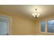 Bright dining room featuring a chandelier and hardwood floors at 126 E Division Ave, Salisbury, NC 28144
