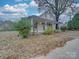 Charming craftsman home with a spacious front porch and mature trees at 126 E Division Ave, Salisbury, NC 28144