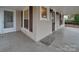 Front porch with wooden flooring and exterior door at 126 E Division Ave, Salisbury, NC 28144