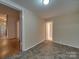 Home hallway with tile flooring and access to other rooms at 126 E Division Ave, Salisbury, NC 28144
