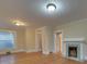 Hardwood floors and a fireplace feature in this spacious living room at 126 E Division Ave, Salisbury, NC 28144