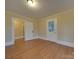 Hardwood floor living room with built-ins at 126 E Division Ave, Salisbury, NC 28144