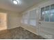 Sunroom with tile floor and multiple windows at 126 E Division Ave, Salisbury, NC 28144