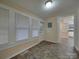 Sunroom with tile floor and multiple windows at 126 E Division Ave, Salisbury, NC 28144