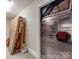 Unfinished basement with insulated walls and visible pipes, offering potential for customization at 14700 Old Vermillion Dr, Huntersville, NC 28078