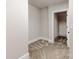 Walk-in closet offers ample storage space, featuring neutral carpet and a clothing rod at 14700 Old Vermillion Dr, Huntersville, NC 28078