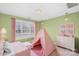 bedroom featuring pink decor and a whimsical tent for play at 5752 Natoma Rd, Lake Wylie, SC 29710