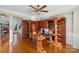 Home office with hardwood floors and custom built-ins at 5752 Natoma Rd, Lake Wylie, SC 29710