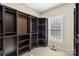 Large walk-in closet with ample shelving and hanging space at 5752 Natoma Rd, Lake Wylie, SC 29710