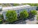 Overhead shot of modern townhomes with white roofs, mature trees, and convenient parking at 947 Warren Burgess Ln, Charlotte, NC 28205