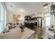 Open-concept living space with hardwood floors and combined living and kitchen at 947 Warren Burgess Ln, Charlotte, NC 28205