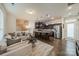 Open-concept living space with hardwood floors and combined living and kitchen at 947 Warren Burgess Ln, Charlotte, NC 28205