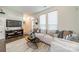 Comfortable living room with hardwood floors, modern furnishings, and a stylish area rug at 947 Warren Burgess Ln, Charlotte, NC 28205
