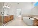 Beautiful bathroom featuring tiled floors, a soaking tub, and a separate glass shower at 1065 Kinship Dr # 080, Lancaster, SC 29720