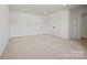 Bright bedroom features neutral carpet, a double closet, white walls, and ample space at 1065 Kinship Dr # 080, Lancaster, SC 29720