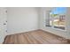 Bright bedroom featuring a large window, natural light, and light colored hardwood floors at 1065 Kinship Dr # 080, Lancaster, SC 29720