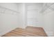 Walk-in closet with wire shelving and luxury vinyl plank flooring at 1065 Kinship Dr # 080, Lancaster, SC 29720