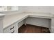 Desk area features countertop, drawers and dark wood floors at 1065 Kinship Dr # 080, Lancaster, SC 29720