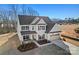 Elegant two-story home with landscaped yard, two car garage and beautiful architectural details at 1065 Kinship Dr # 080, Lancaster, SC 29720