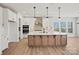 Spacious kitchen featuring stainless steel appliances, granite countertops, and a large kitchen island at 1065 Kinship Dr # 080, Lancaster, SC 29720