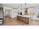 Beautiful kitchen with a large island, pendant lighting, and modern stainless steel appliances at 1065 Kinship Dr # 080, Lancaster, SC 29720