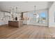 Open kitchen featuring stainless steel appliances, granite countertops, and a large kitchen island at 1065 Kinship Dr # 080, Lancaster, SC 29720
