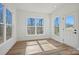 Sun room with ample natural light, wood flooring, and view of the exterior at 1065 Kinship Dr # 080, Lancaster, SC 29720
