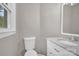 Clean bathroom with vanity, marble countertop, and large mirror at 130 Island Park Ln, Statesville, NC 28625
