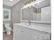 Modern bathroom with white vanity and quartz countertop at 130 Island Park Ln, Statesville, NC 28625