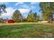 Brick house exterior with deck and large backyard at 130 Island Park Ln, Statesville, NC 28625