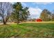Brick house exterior with deck and large backyard at 130 Island Park Ln, Statesville, NC 28625
