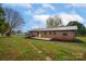 Brick house exterior with deck and large backyard at 130 Island Park Ln, Statesville, NC 28625