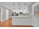 Modern kitchen with stainless steel appliances and granite countertops at 130 Island Park Ln, Statesville, NC 28625
