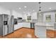 Updated kitchen features stainless steel appliances and granite countertops at 130 Island Park Ln, Statesville, NC 28625