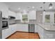Bright kitchen with stainless steel appliances and granite countertops at 130 Island Park Ln, Statesville, NC 28625
