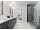 Modern bathroom with double vanity, walk-in shower, and sleek fixtures at 2201 Catalina Ave, Charlotte, NC 28206