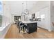 Spacious kitchen featuring a large island with seating, modern appliances, and ample cabinet space at 2201 Catalina Ave, Charlotte, NC 28206