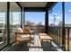 Relaxing covered porch with comfortable seating and a view of the sky at 2201 Catalina Ave, Charlotte, NC 28206
