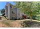 The property has a private backyard with mature trees and a deck at 3848 Burnage Hall Rd, Harrisburg, NC 28075