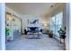 Cozy living room with bright window, plush seating, and elegant decor at 3848 Burnage Hall Rd, Harrisburg, NC 28075