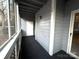 Enclosed screened porch with access to the home's exterior at 6017 Treetop Ct, Charlotte, NC 28212